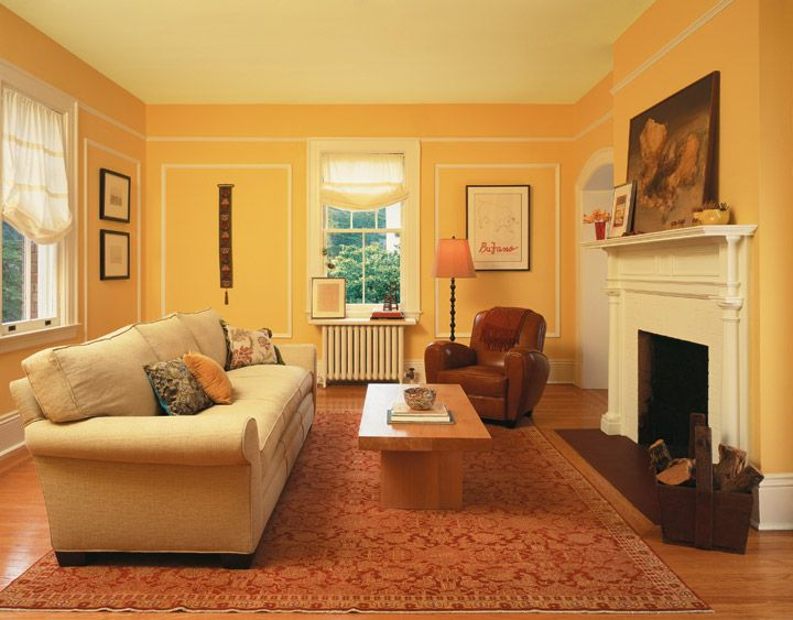 Warm-toned living room with freshly painted peach walls by a house painter in Honolulu, HI.