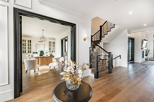 Modern home interior with white walls, smooth matte finish, and black trim and doors, by an interior painter in Mililani, HI.